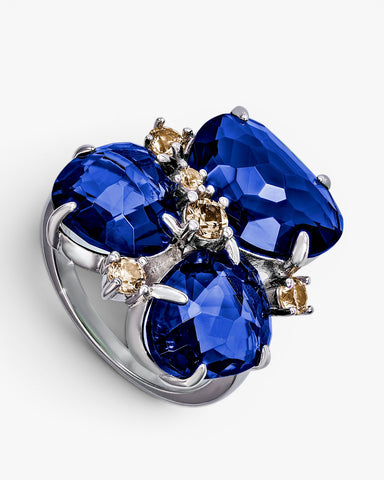 Anillos con piedras en tono cobalto y circonitas