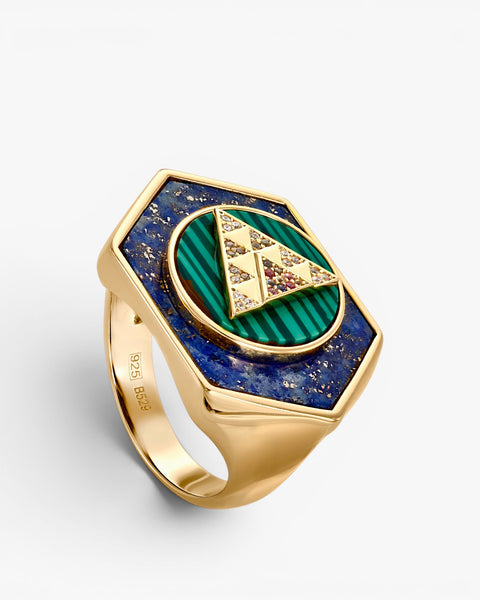 Rings with stones made of lapis lazuli, malachite, and cubic zirconia.