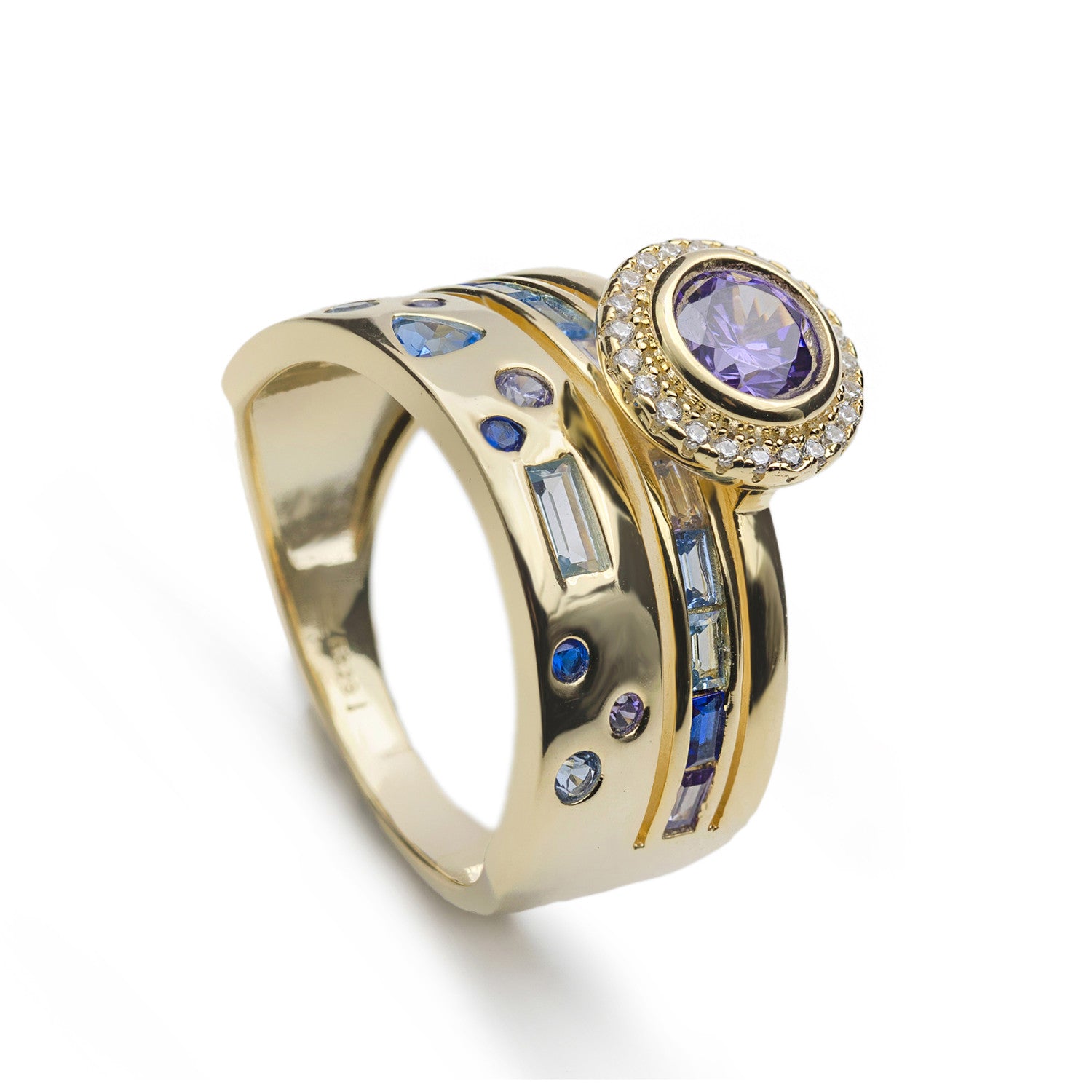 Anillo ancho de plata bañada en oro con gemas de colores tonos lilas