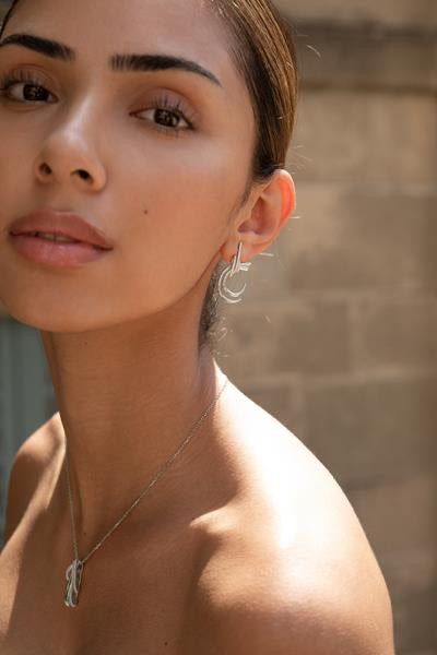 Pendientes originales de plata diseño nudo circonitas