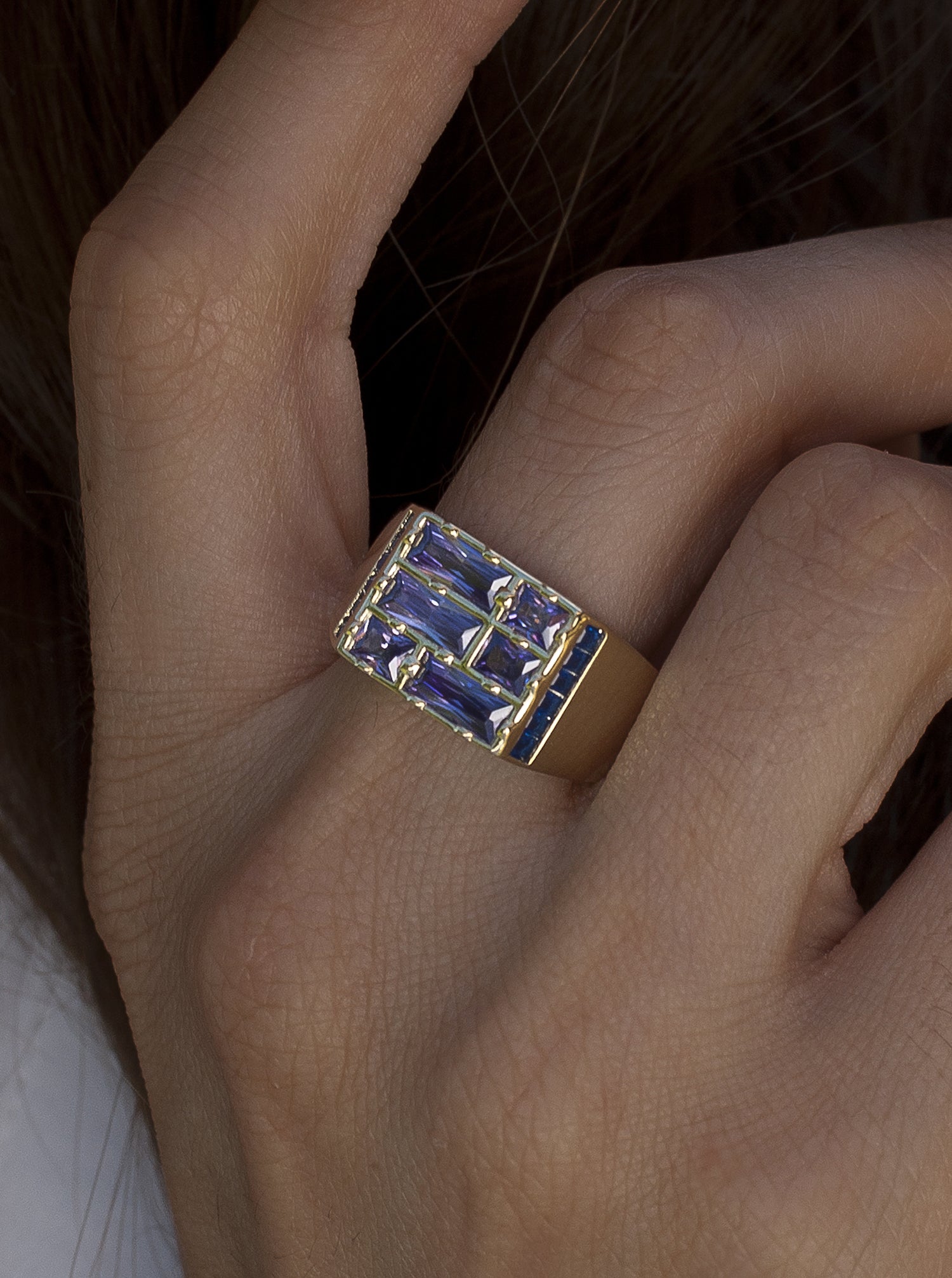 Rings with amethyst and sapphire-toned stones