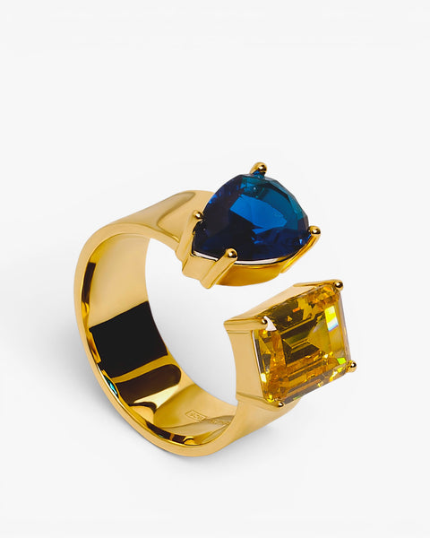 Rings with open design stones in azurite and citrine tones
