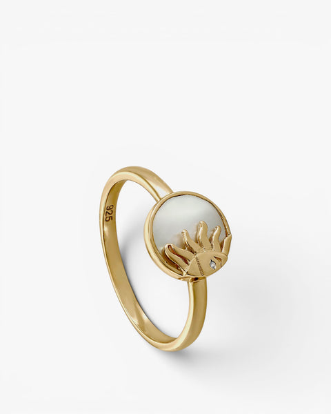 Silver signet ring with solar design and mother-of-pearl