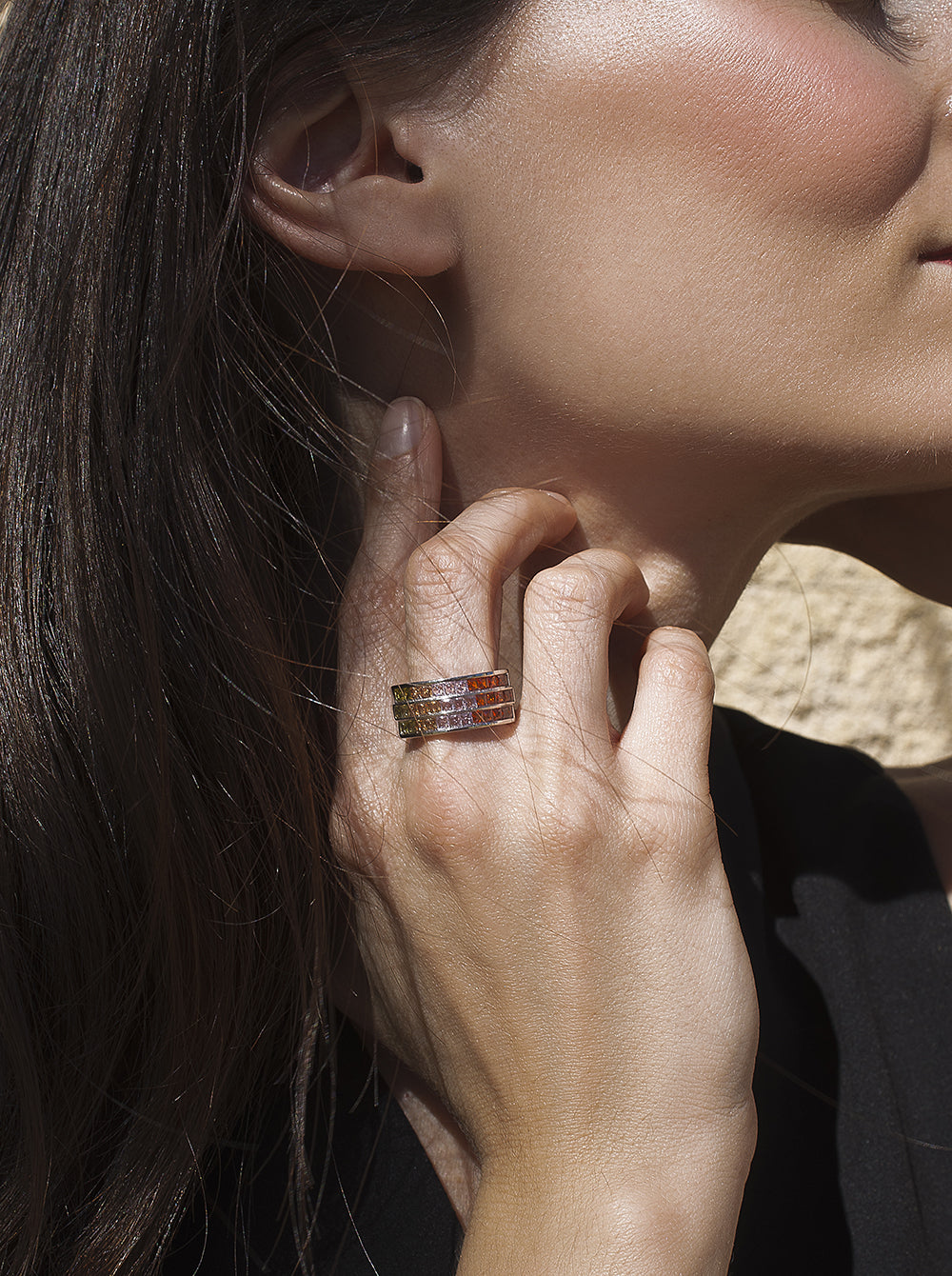 Rings with triple rail stones in warm tones