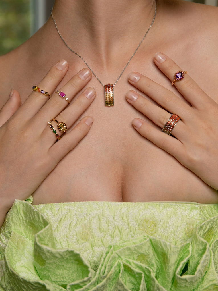 Rings with triple rail stones in warm tones
