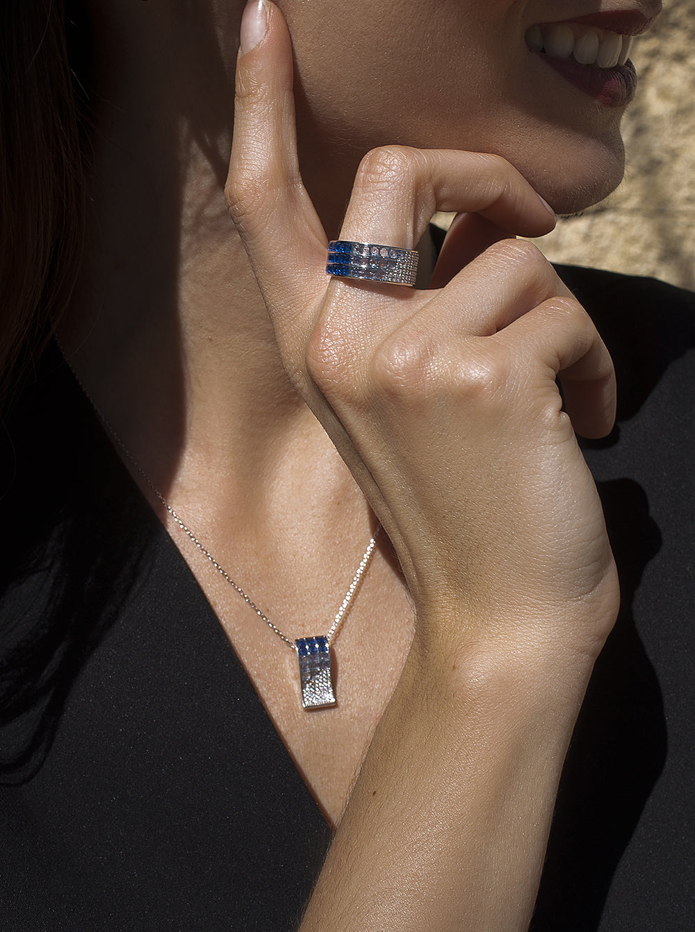 Rings with triple rail stones in shades of blue