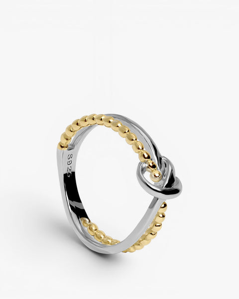 Anillos bicolor de plata diseño doble raíl con nudo