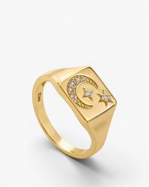 Silver signet ring with moon and stars motif