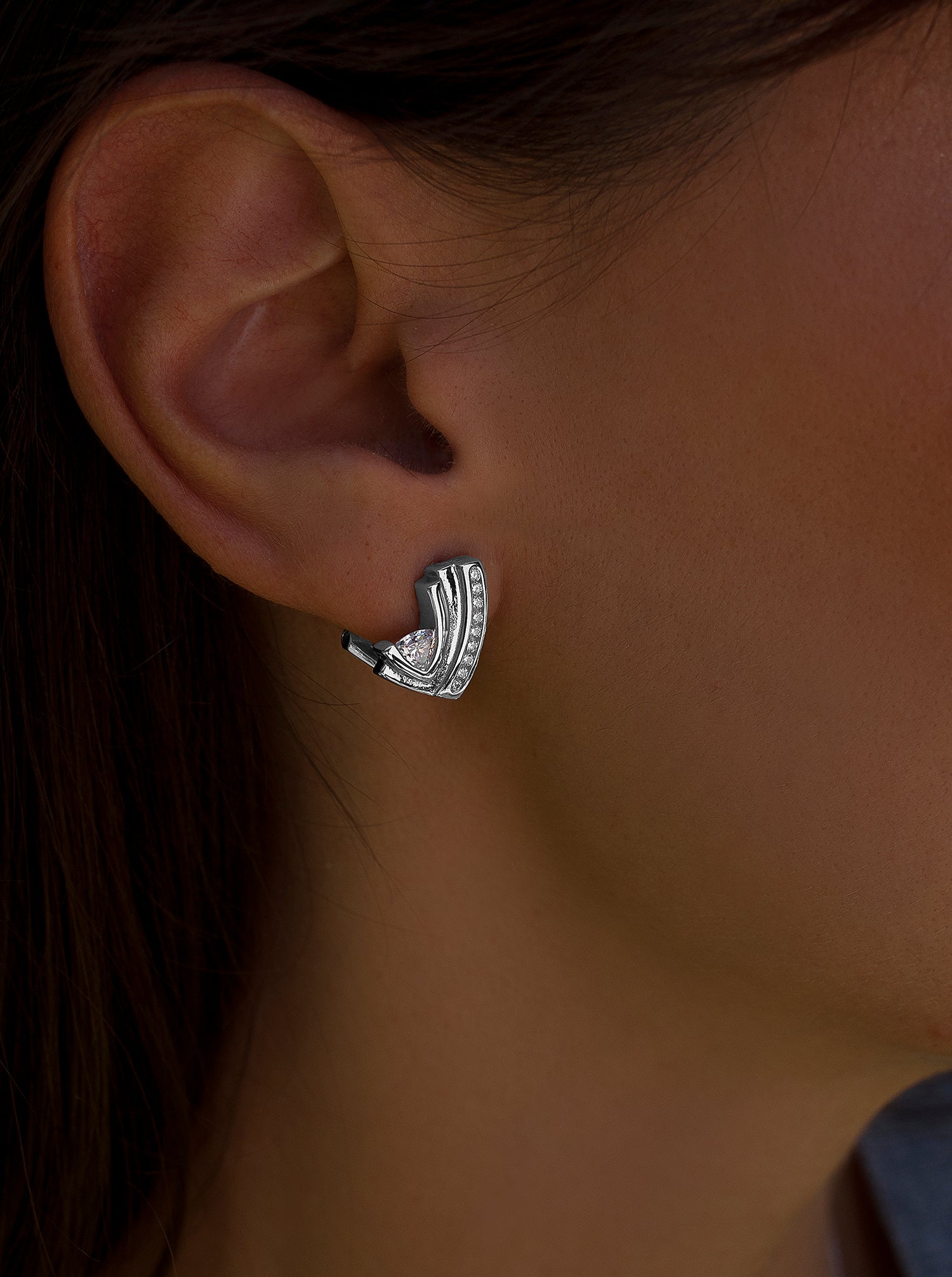 Silver omega clasp earrings with cubic zirconia detail