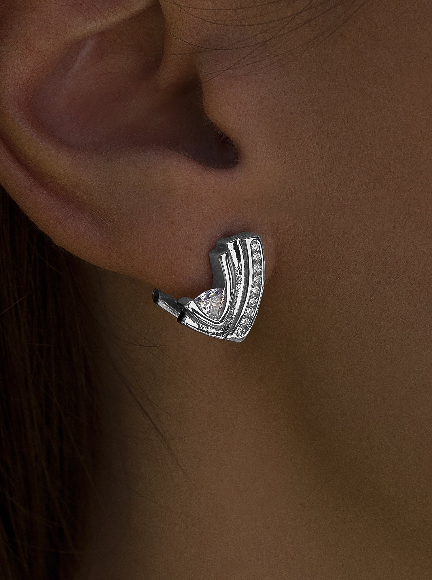 Silver omega clasp earrings with cubic zirconia detail