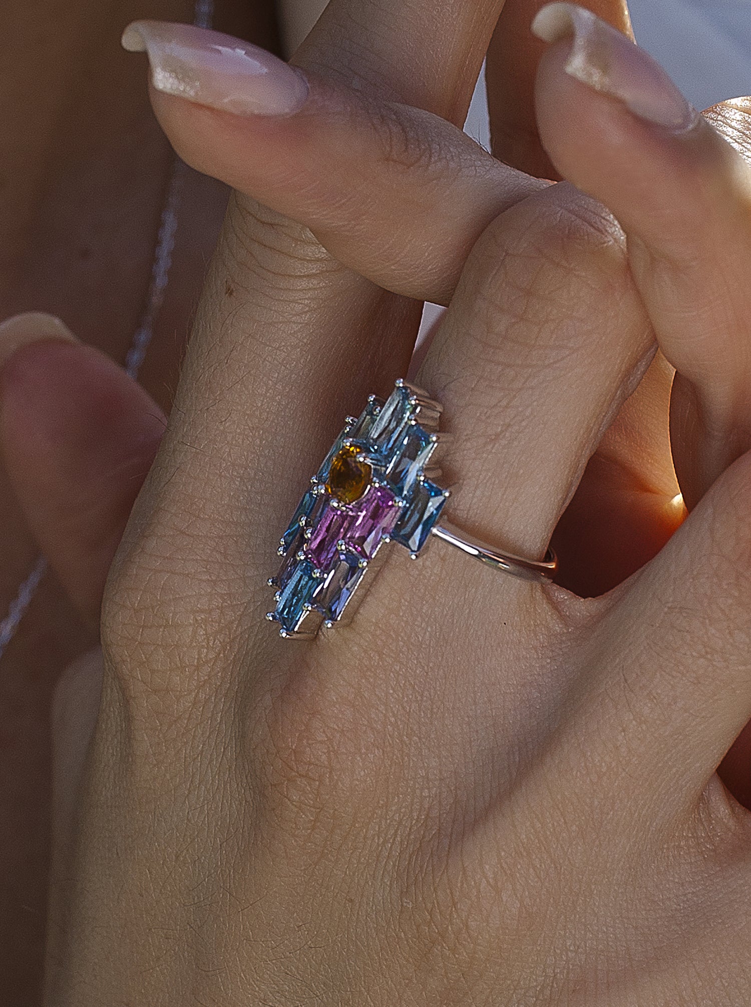 Rings with colorful stones in a geometric style