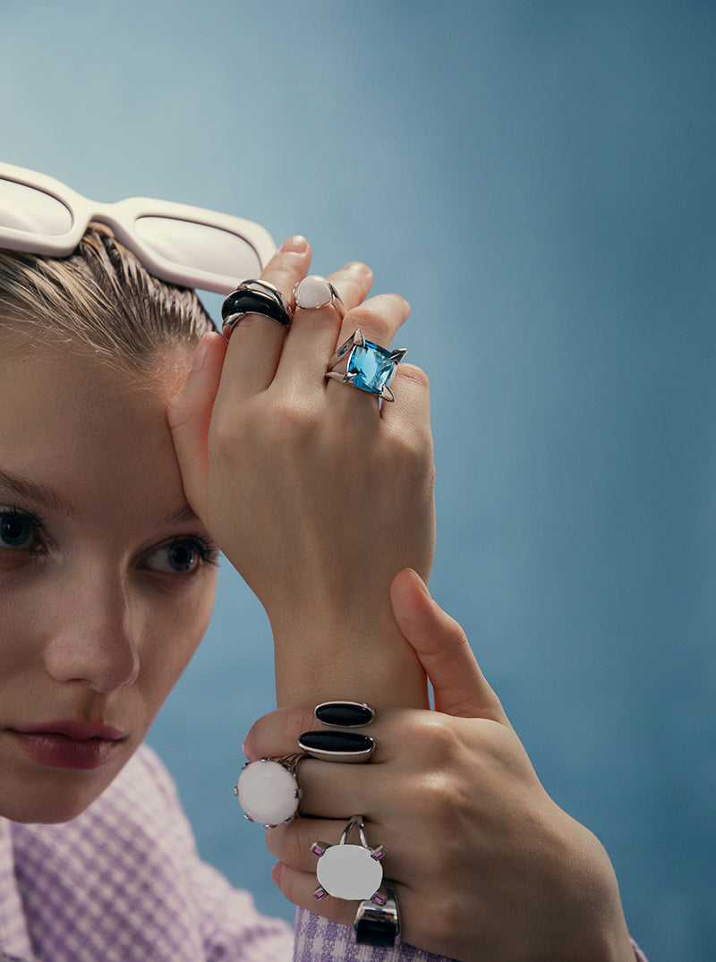 Rings with avant-garde design stones in black tones