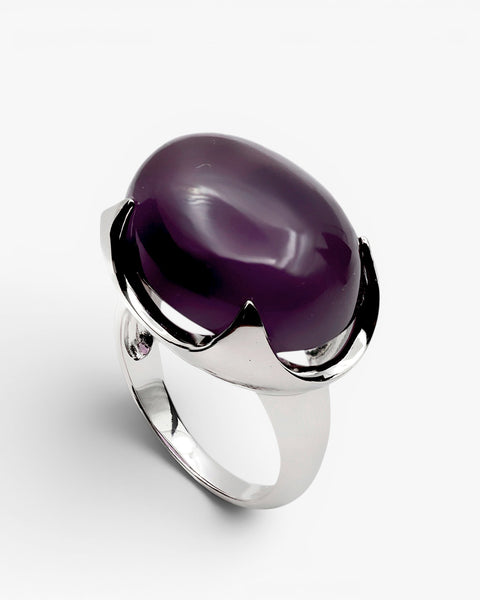 Rings with oval-shaped stones in a purple tone