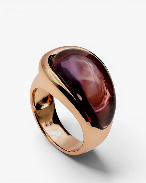 Anillo con piedra morada y plata bañada en rosa