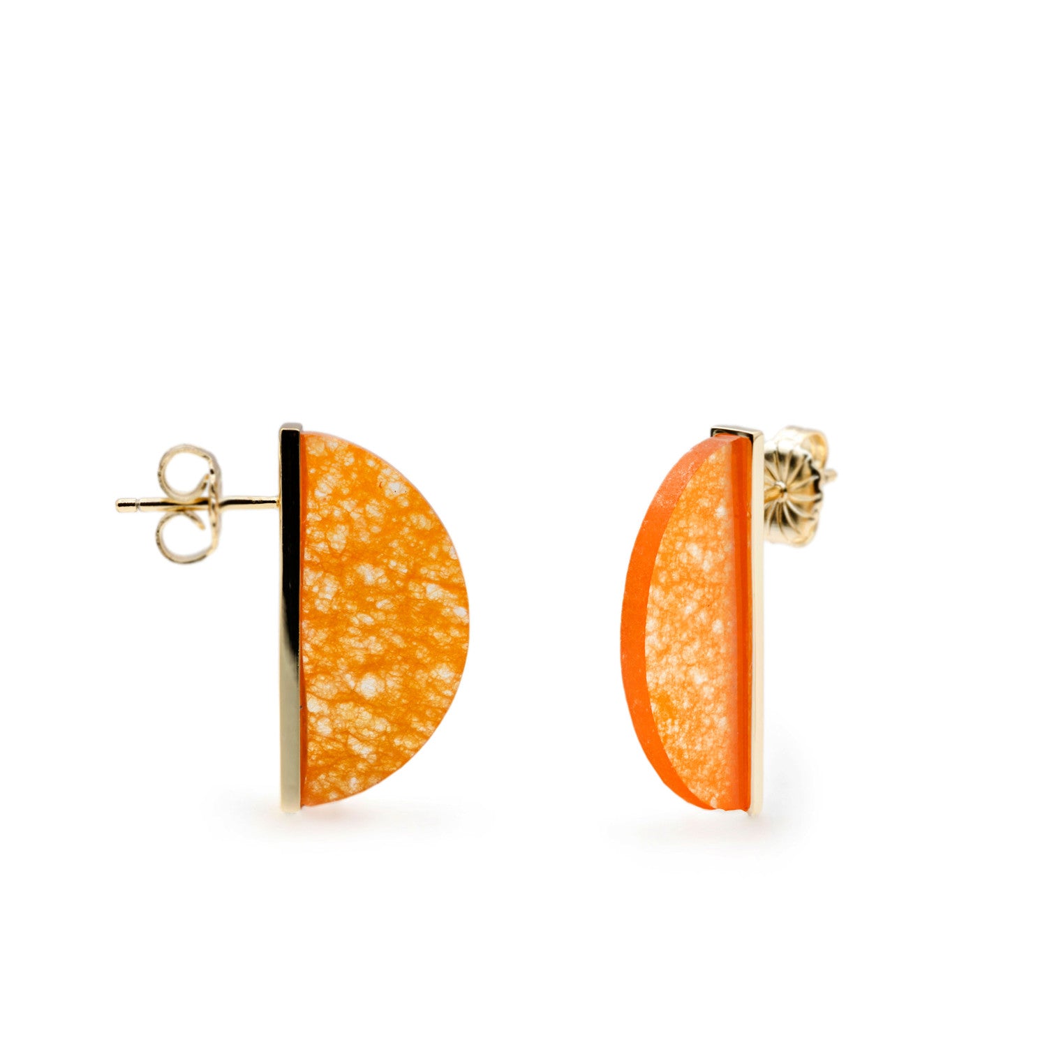 Earrings in orange-toned stone in the shape of a half circle