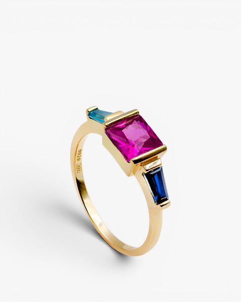 Anillo con piedras pieza central en rosa y piezas laterales en tonos azul