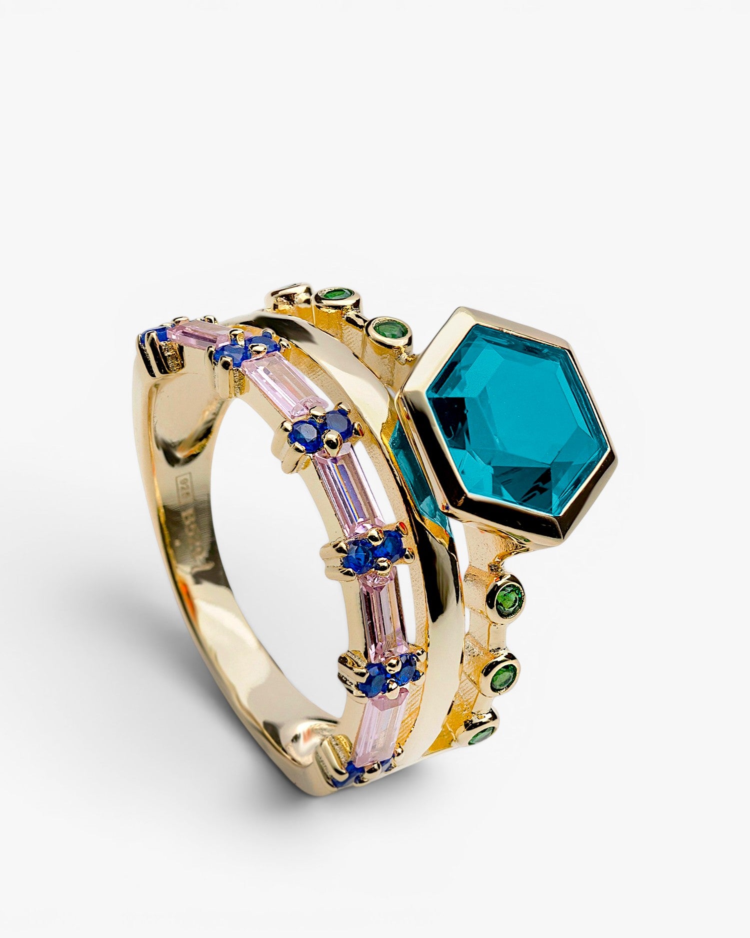 Bague large en argent plaqué or avec pierres bleues
