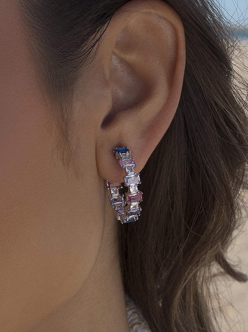 Hoop earrings with blue and purple colored stones