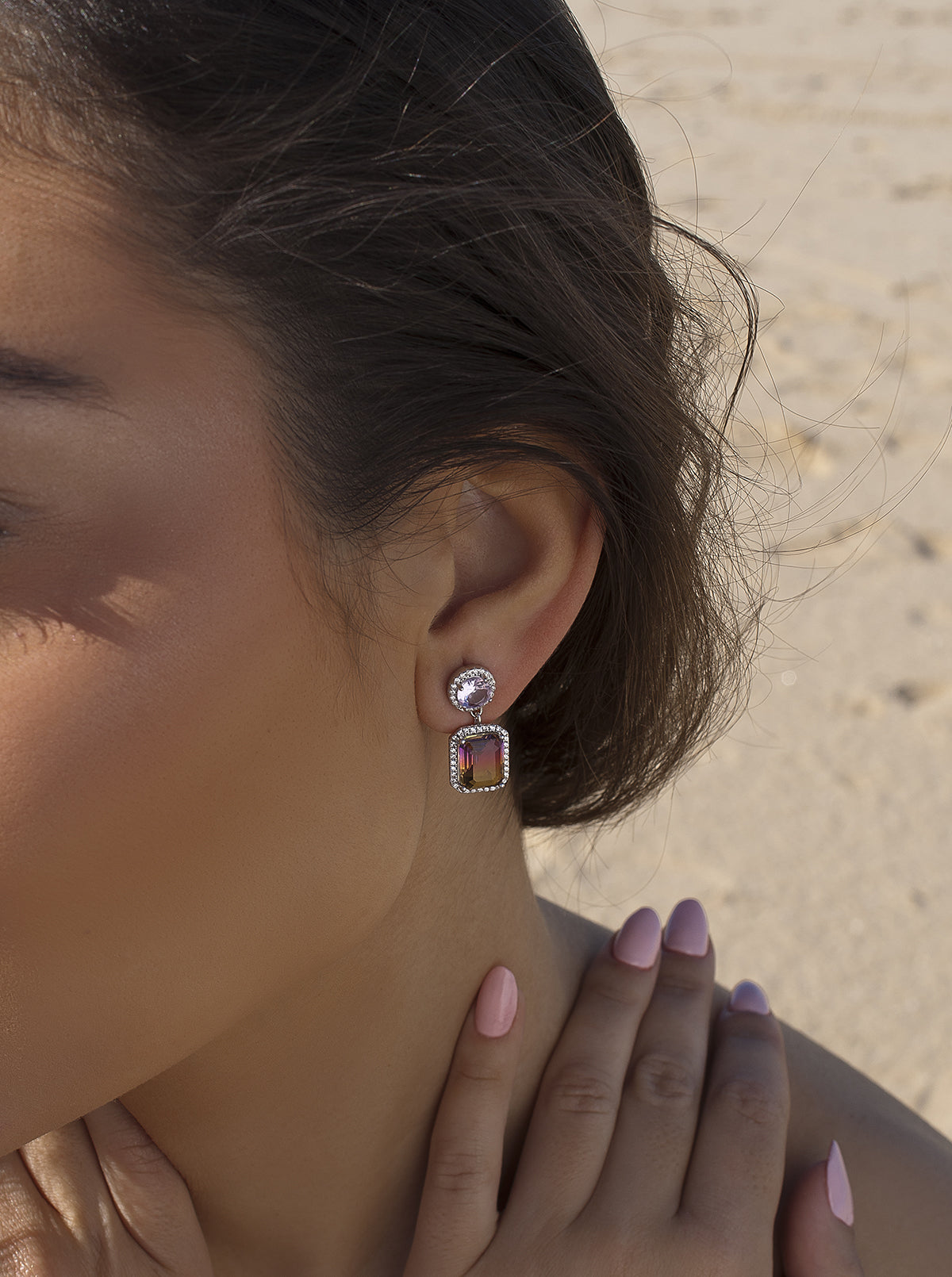 Earrings with colorful stones in shades of lavender and yellow