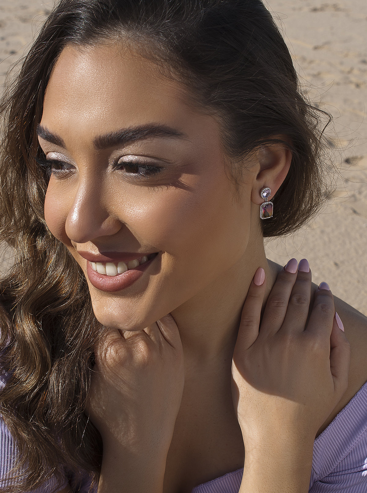 Earrings with colorful stones in shades of lavender and yellow