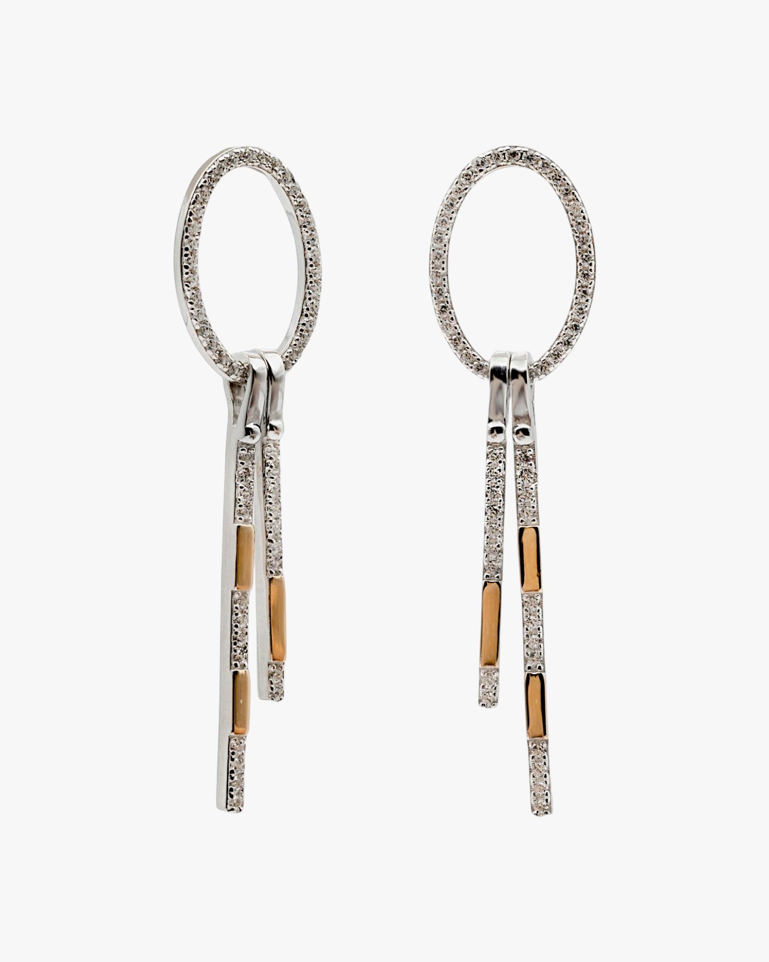 Two-tone oval earrings with dangling lines