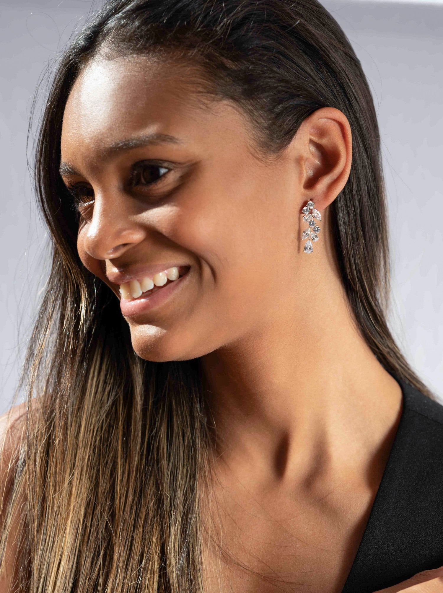 Bridal earrings with a cascading floral design