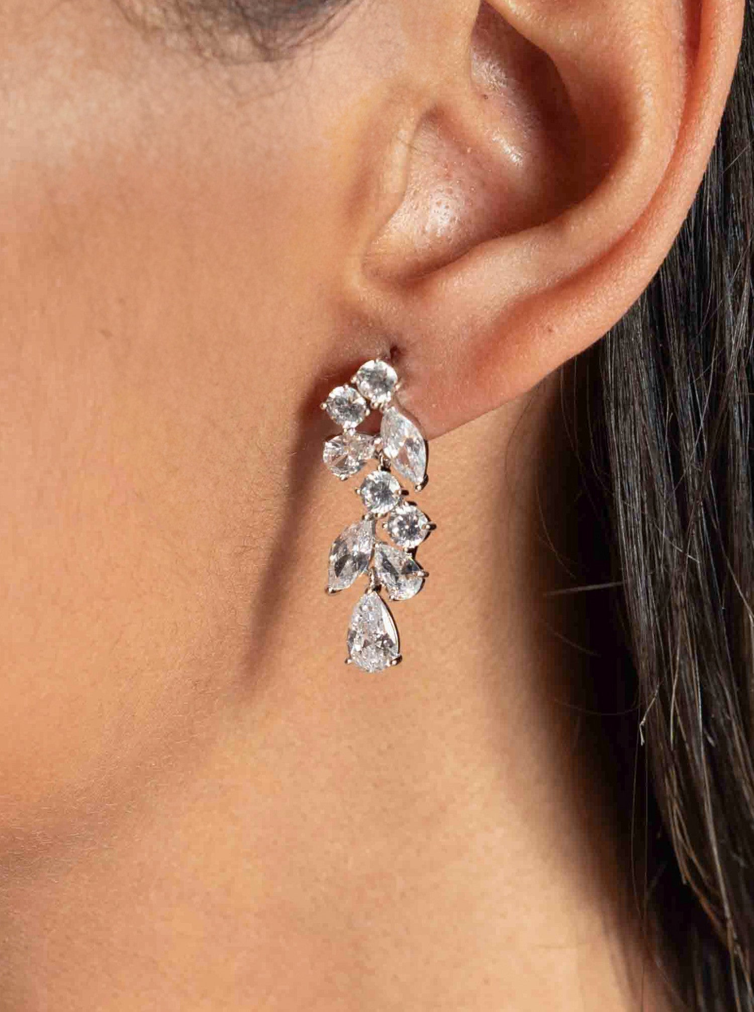 Bridal earrings with a cascading floral design