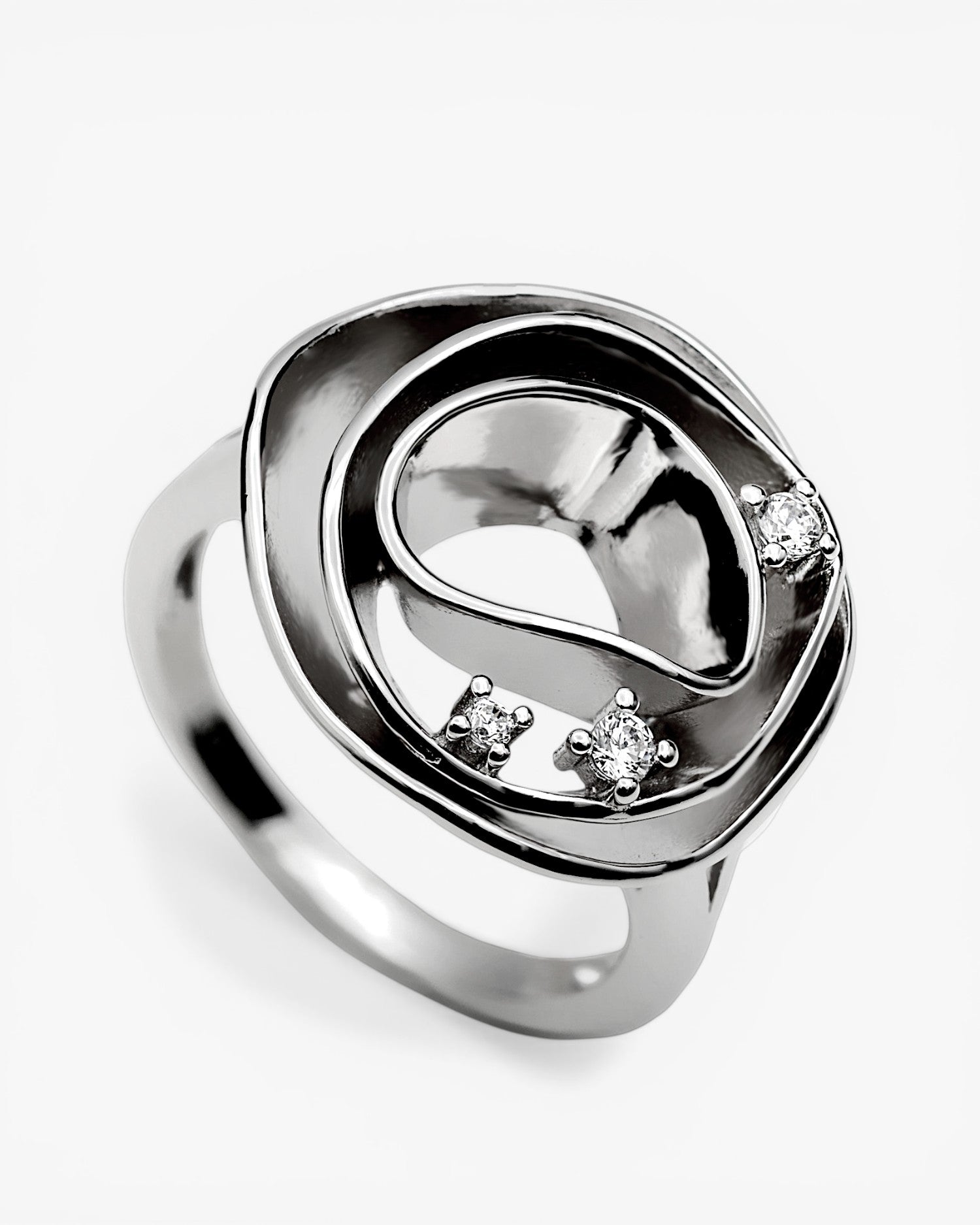 Large silver rings with a modern, oval design