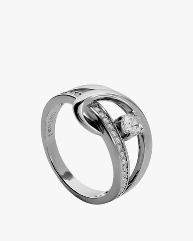 Silver criconite rings with a central cubic zirconia in a tangled design