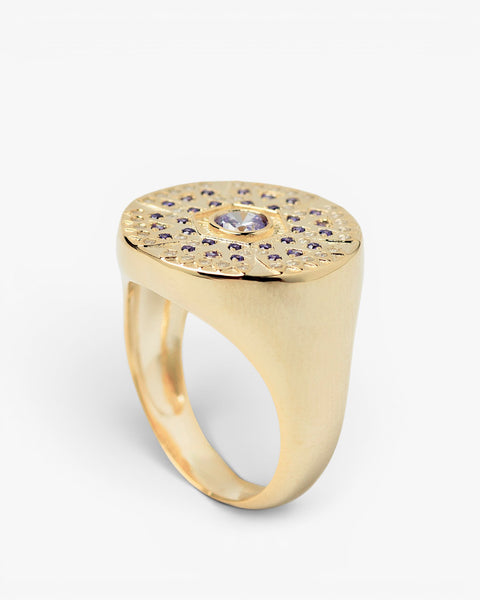 Rings with purple-toned stones, round design