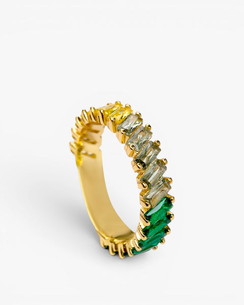 Rings with baguette-cut stones in shades of green