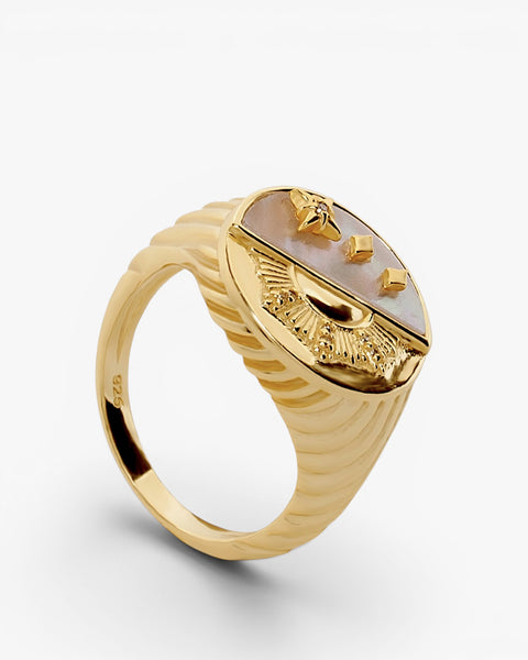 Silver signet ring with celestial design combined with mother-of-pearl