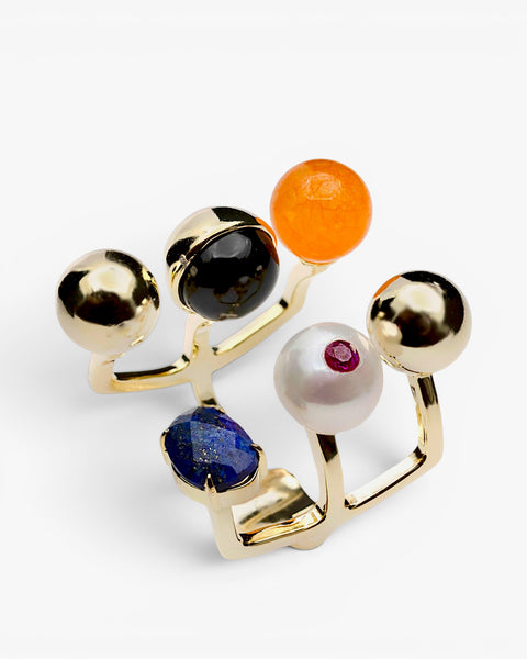 Anillos de diseño con esferas en tonos vibrantes