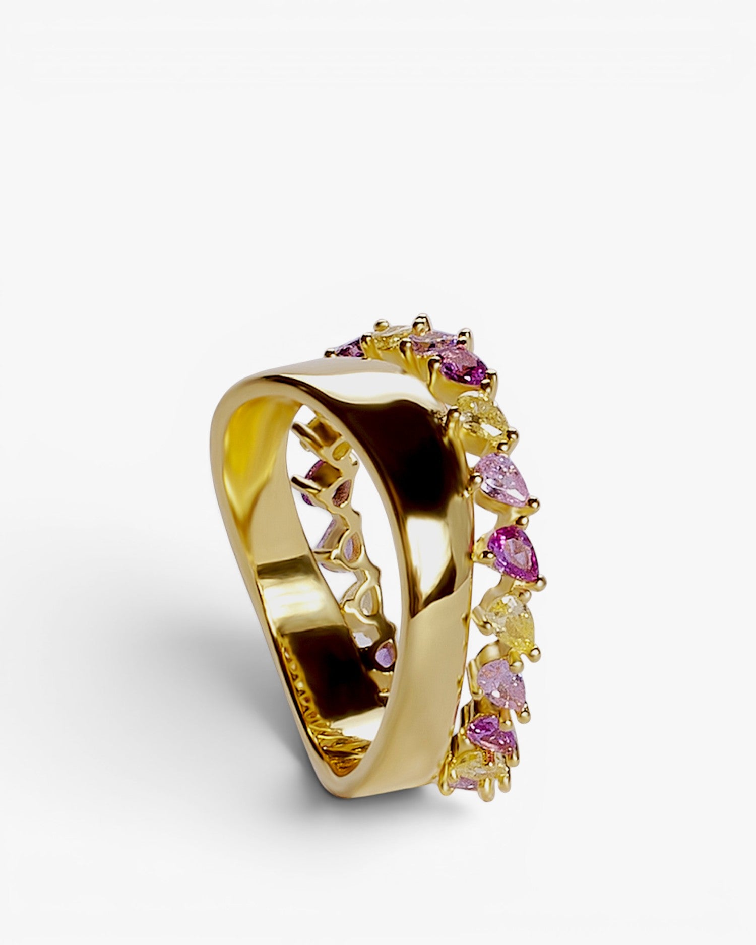 Anillos con piedras tono rosa diseño entrelazado