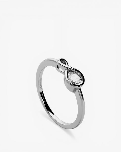 Anillo fino de plata forma lazo con circonita