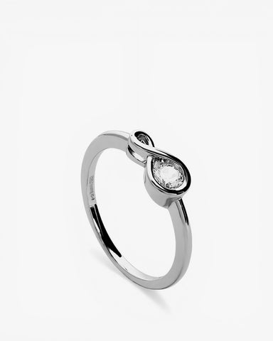 Anillo fino de plata forma lazo con circonita