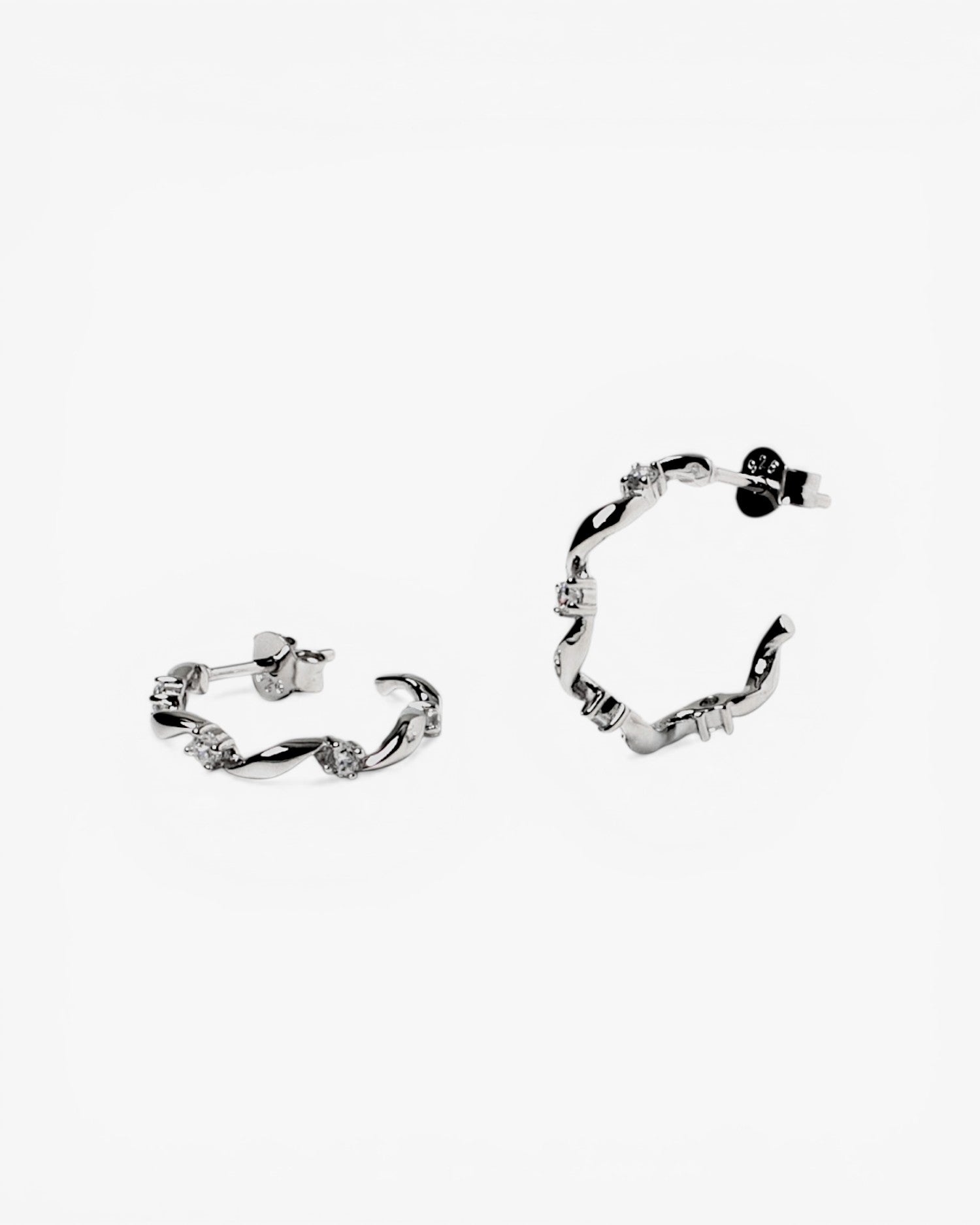 Silver earring with irregular line cubic zirconia