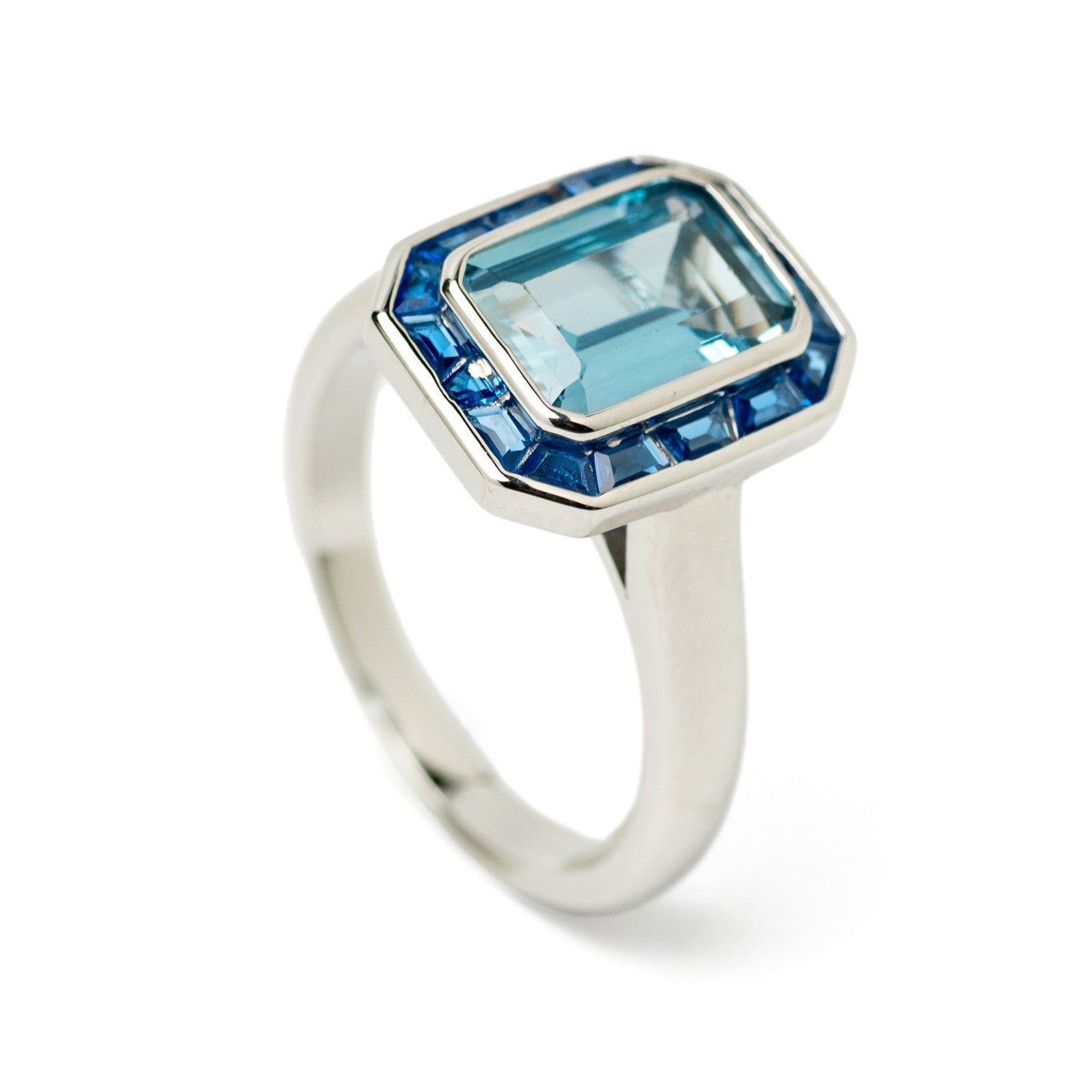 Rings with blue emerald-cut stones