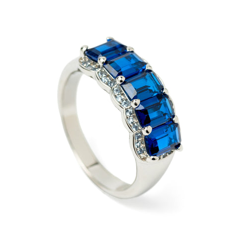Rings with emerald-cut stones in an azurite tone