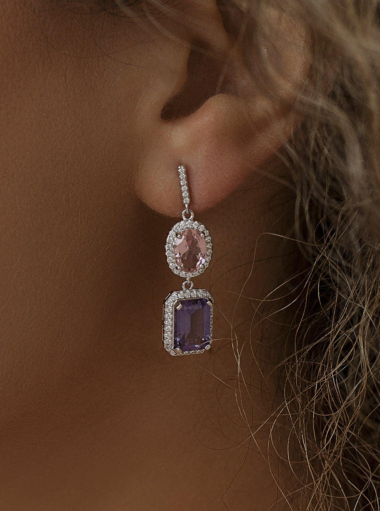 Earrings made with pink and hematite colored stones