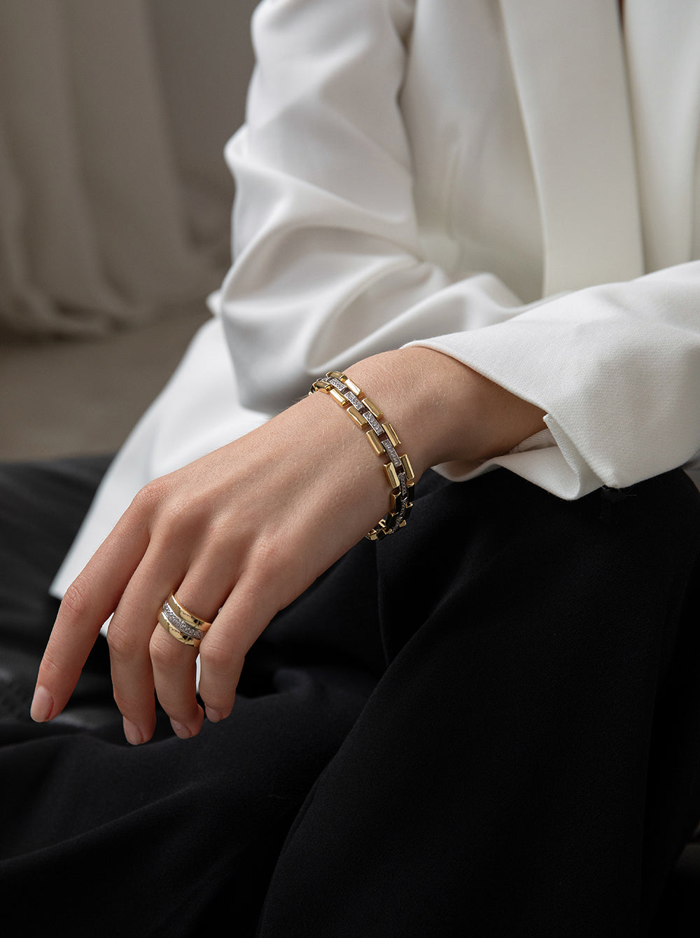 Bracelet bicolore avec structure mobile et zircone cubique