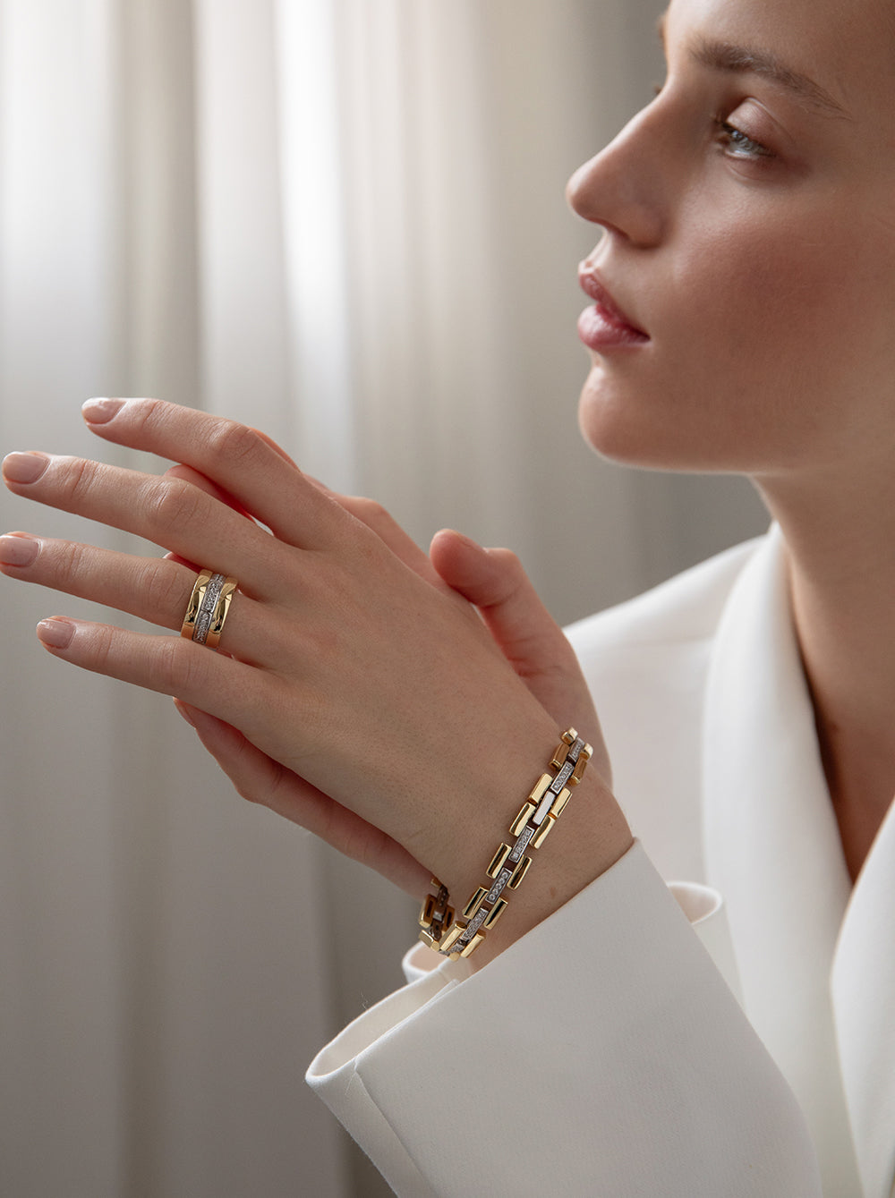 Bracelet bicolore avec structure mobile et zircone cubique