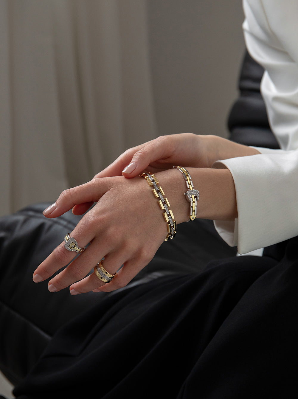 Bracelet bicolore avec structure mobile et zircone cubique