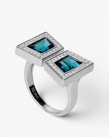 Anillo doble de plata con circonitas azul y halo de circonitas