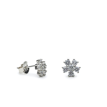 Pendientes pequeños de plata con circonitas silueta floral