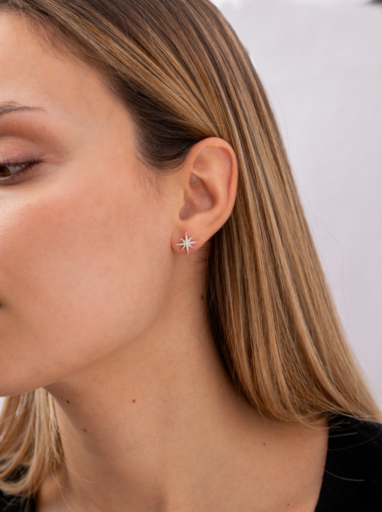 Star-inspired silver earrings with cubic zirconia