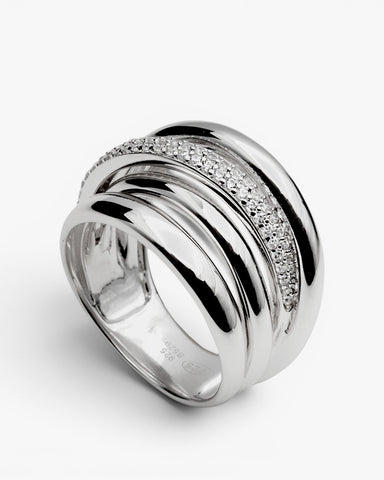 Anillo ancho de plata con rail de circonita superpuesta