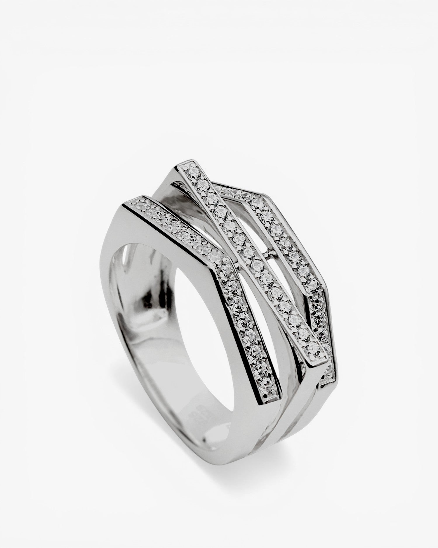Wide ring with geometric shapes of cubic zirconia