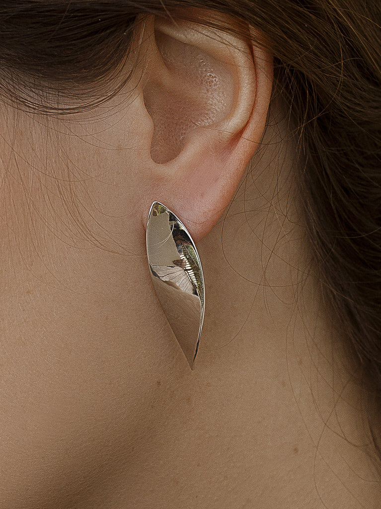 Original silver earrings with a curved design