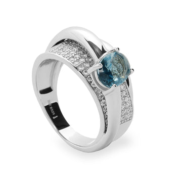Anillo de plata enredados con circonita tono aqua